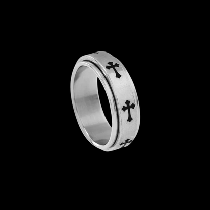 Close up view of the LuxCrux™ Cross Rotatable Ring on a black background.