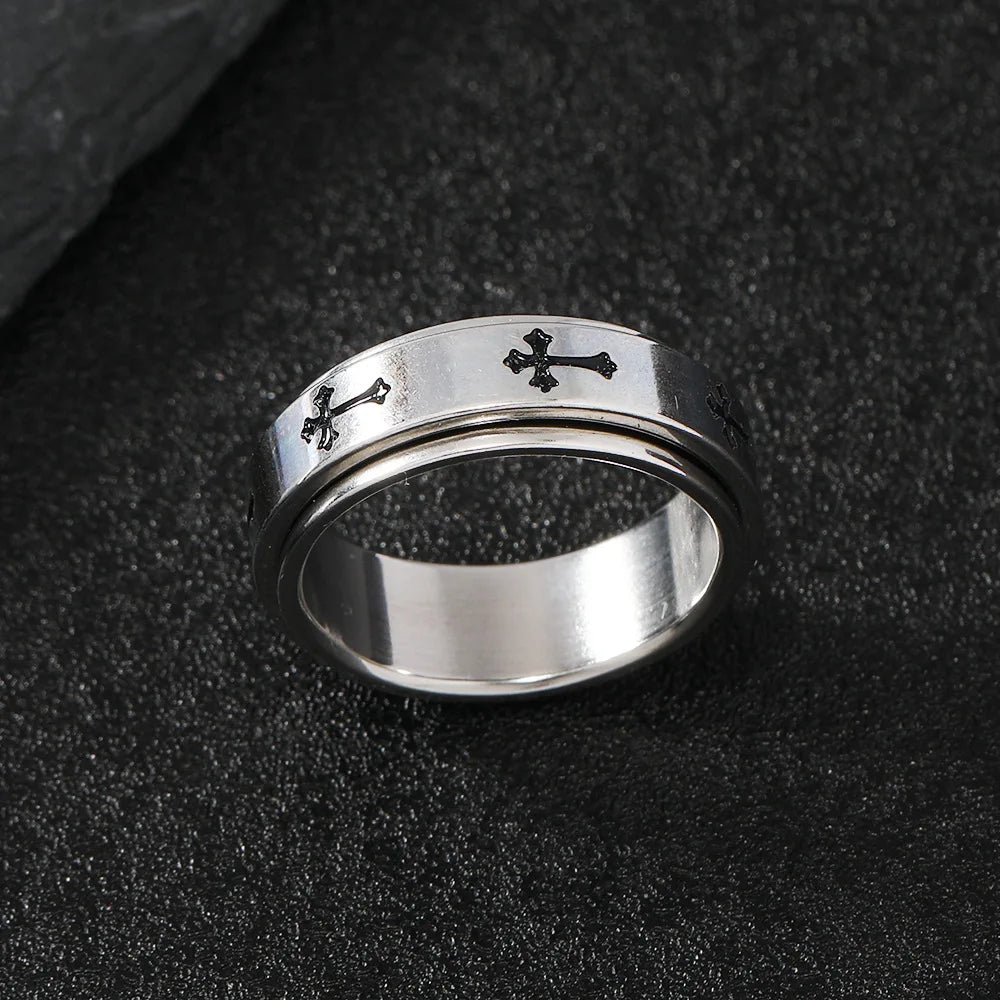 Close up above view of the LuxCrux Rotatable Ring on a stone.