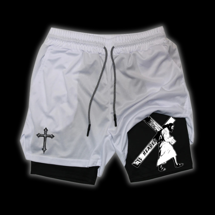 Close up front view of LuxCrux Jesus Shorts, White/Black variant on a black background